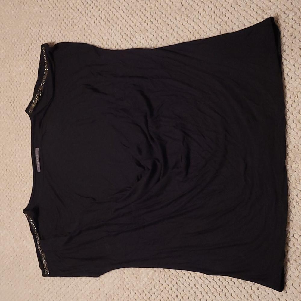 Black top with beaded detail on shoulder